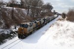 On a very cold day, CSX 877 & 5491 bring Q326 eastward on the GR Sub